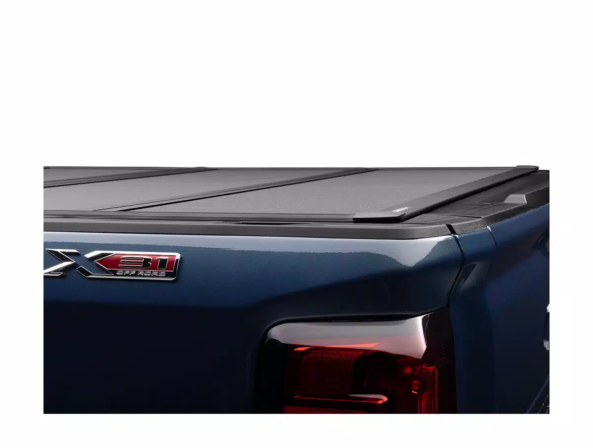 BakFlip MX4 Hard Folding Tonneau Cover - 2021 to 2025 Ford F150 Raptor Lighting w/ 5'7 Bed