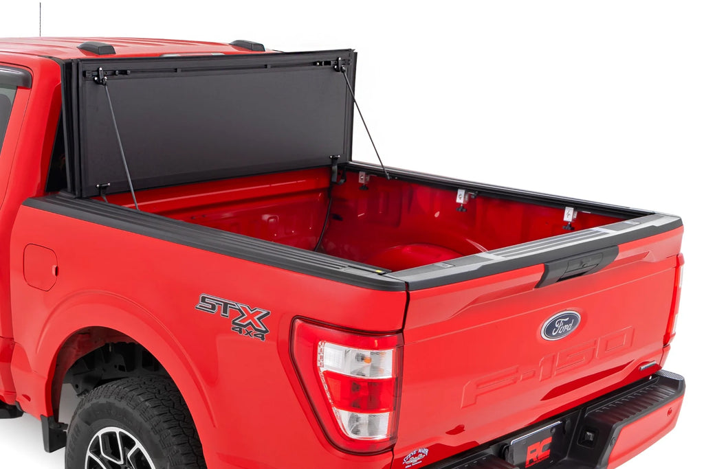 Rough Country Hard Tri-Fold Flip Up Bed Cover 5'7" Bed | Ford F-150 2WD/4WD (2015-2020)